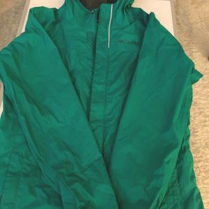 Columbia green rain jacket. Boys large. Waterproof. Gently used. Lined w mesh.